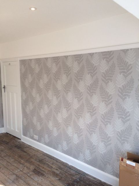 Room freshly papered in a patterned design